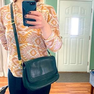 Tignanello emerald green genuine leather purse.